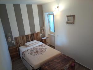 Posteľ alebo postele v izbe v ubytovaní Agriturismo Casa Orsini