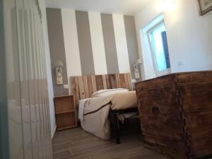 Posteľ alebo postele v izbe v ubytovaní Agriturismo Casa Orsini