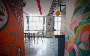 A restaurant or other place to eat at Onefam Budapest