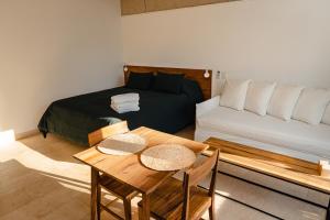 En eller flere senger på et rom på Ara Homes Buenos Aires