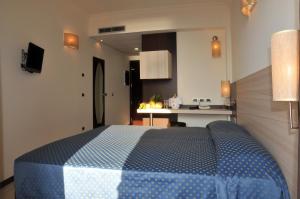 Posteľ alebo postele v izbe v ubytovaní Morcavallo Hotel & Wellness