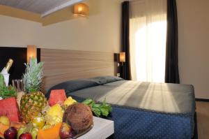 Posteľ alebo postele v izbe v ubytovaní Morcavallo Hotel & Wellness