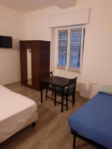 Postel nebo postele na pokoji v ubytování B&B Confine