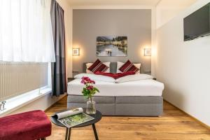 Postel nebo postele na pokoji v ubytování Apartments Greisslerei