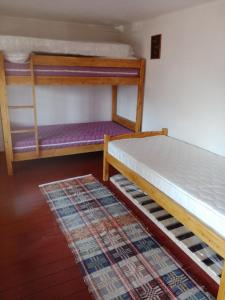 Posteľ alebo postele v izbe v ubytovaní Chata u Kuba