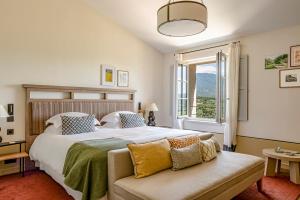 מיטה או מיטות בחדר ב-Hotel Crillon le Brave