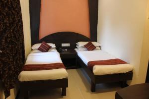 Postel nebo postele na pokoji v ubytování Hotel Fortune