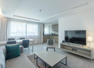 Μια τηλεόραση ή/και κέντρο ψυχαγωγίας στο Makass Appart Hotel