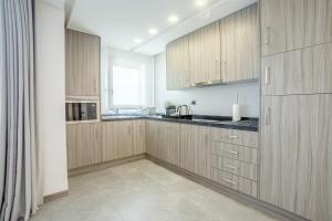 Η κουζίνα ή μικρή κουζίνα στο Makass Appart Hotel
