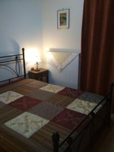 A bed or beds in a room at Optasia