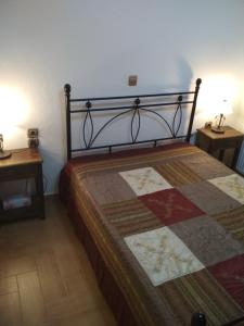 A bed or beds in a room at Optasia