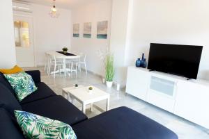 TV a/nebo společenská místnost v ubytování Family complex Mi Capricho 1, sea view