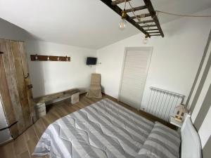 Posteľ alebo postele v izbe v ubytovaní Agriturismo Casa Orsini