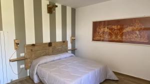 Posteľ alebo postele v izbe v ubytovaní Agriturismo Casa Orsini