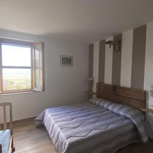 Posteľ alebo postele v izbe v ubytovaní Agriturismo Casa Orsini