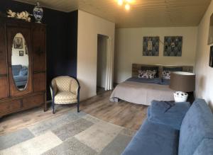 Posezení v ubytování Familienpension Obere Juchhe, Ferienwohnung und Zimmer