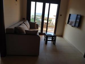 A seating area at Luxury penthouse with sea view