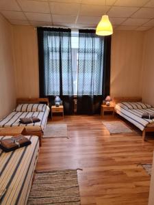 Postel nebo postele na pokoji v ubytování Bei Chogman + 22 fotografií