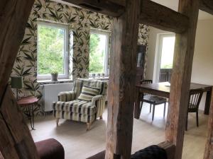 Posezení v ubytování Familienpension Obere Juchhe, Ferienwohnung und Zimmer