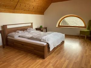 Postel nebo postele na pokoji v ubytování Ubytování Bořeňovice