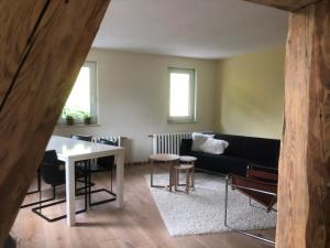 Posezení v ubytování Familienpension Obere Juchhe, Ferienwohnung und Zimmer