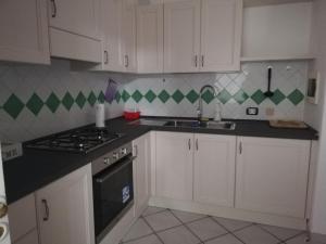 A kitchen or kitchenette at A CASA