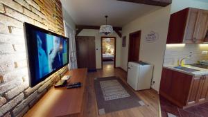 A kitchen or kitchenette at Apartmán Marta, 200 m Ski Tatranska Lomnica