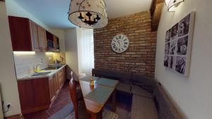 A kitchen or kitchenette at Apartmán Marta, 200 m Ski Tatranska Lomnica