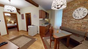 A kitchen or kitchenette at Apartmán Marta, 200 m Ski Tatranska Lomnica