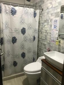 Koupelna v ubytování Hotel Palmi