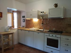 Kuchyňa alebo kuchynka v ubytovaní Apartments Lili I