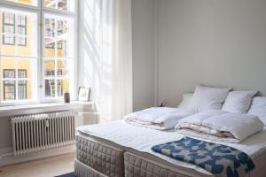 Katil atau katil-katil dalam bilik di ApartmentInCopenhagen Apartment 1400