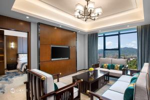 TV a/nebo společenská místnost v ubytování Ramada Encore by Wyndham Chenzhou North