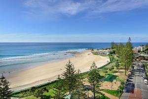 an aerial view of a beach and the ocean at Bayview Apartments Rainbow Bay in Gold Coast