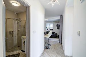 a bathroom with a shower and a sink at Nehaj in Senj +64 photos