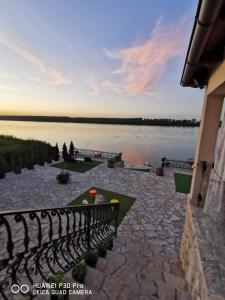 a view of a lake from a building at Vila Orešac in Smederevo