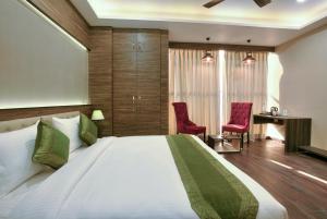 เตียงในห้องที่ Southwest Inn - Boutique Hotel