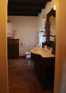 a bathroom with a sink and a toilet in it at Villa Concetta in San Giovanni in Fiore