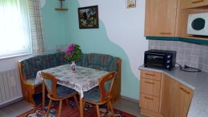 Kuchyň nebo kuchyňský kout v ubytování Haus Margarete + 19 fotografií