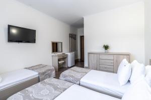 Voodi või voodid majutusasutuse Hotel Adrenalin toas