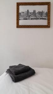 Postel nebo postele na pokoji v ubytování Hotel Internationaal