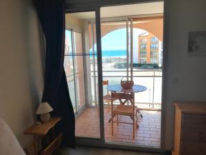 Un balcón o terraza en Cap de Mer - Vue sur mer - Une chambre - Une terrasse - Accès direct plage - Commerces à proximités