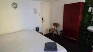 Postel nebo postele na pokoji v ubytování Hotel Internationaal