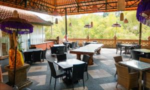 Restoran või mõni muu söögikoht majutusasutuses Ubud Hotel & Cottages