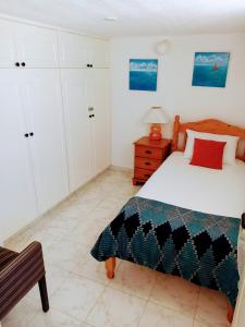 A bed or beds in a room at Sea front Villa Vera