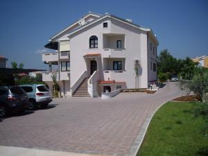 Fotografia z galérie ubytovania Apartmani Manzoni v destinácii Punat