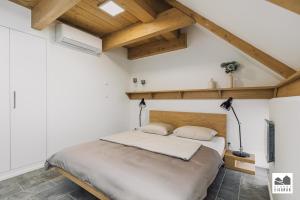 Postel nebo postele na pokoji v ubytování Resort Lednice - Eisgrub