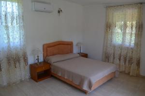 Katil atau katil-katil dalam bilik di Artemis Studios - Pool and garden