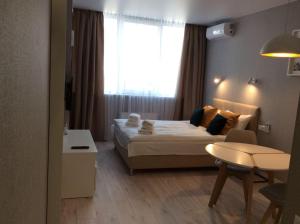 En eller flere senge i et værelse på Smart Studio Galaxy 2 floor