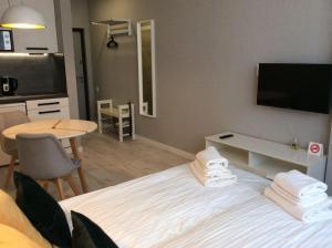 Et tv og/eller underholdning på Smart Studio Galaxy 2 floor